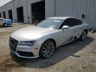 2014 Audi A7 with VIN WAU2MBFC2EN121534, listed as a Copart auction lot 59330165 with 115,882 mi miles and Salvage title. Bid and sale history available at DreamBid. Image 1.