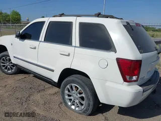 2007 Jeep Grand Cherokee Limited with VIN 1J8HR58207C551946, listed as a IAAI auction lot 41726255 with 217,651 mi miles. Bid and sale history available at carsss.com. Image 3.