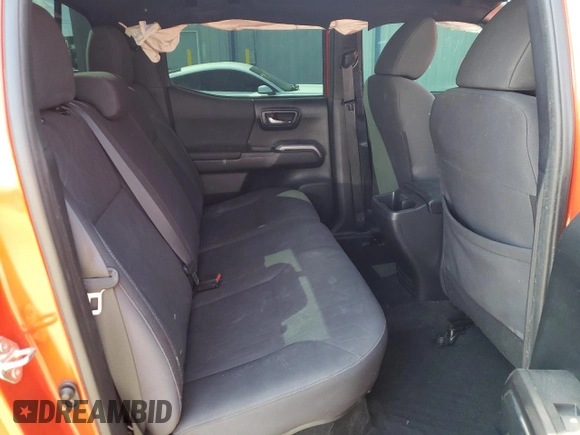 2017 Toyota Tacoma SR5 z VIN 3TMCZ5AN1HM096157, wystawiony jako Copart lot #74628764 z przebiegiem 91 998 mil mil oraz Szkoda całkowita • Salvage title. Historia ofert i sprzedaży dostępna na DreamBid. Obrazek 10.