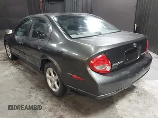 2001 Nissan Maxima SE with VIN JN1CA31A91T112866, listed as a IAAI auction lot 42372546 with 156,069 mi miles and . Bid and sale history available at DreamBid. Image 3.