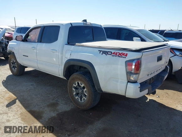 2023 Toyota Tacoma 4WD SR with VIN 3TMCZ5AN7PM653250, listed as a IAAI auction lot 41673534 with 19,496 mi miles. Bid and sale history available at carsss.com. Image 3.