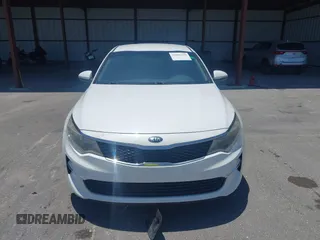 2018 Kia Optima S with VIN 5XXGT4L35JG251681, listed as a IAAI auction lot 42302319 with 154,612 mi miles and . Bid and sale history available at DreamBid. Image 12.