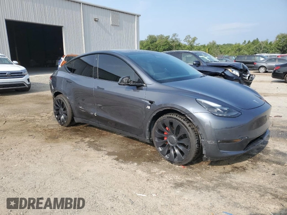 2022 Tesla Model Y Performance with VIN 7SAYGDEF4NF447462, listed as a Copart auction lot 58306595 with 61,671 mi miles and Non repairable. Bid and sale history available at DreamBid. Image 4.