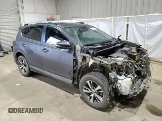 2018 Toyota RAV4 XLE with VIN 2T3WFREV3JW423623, listed as a Copart auction lot 47364675 with 132,510 mi miles and Salvage Title. Bid and sale history available at DreamBid. Image 4.