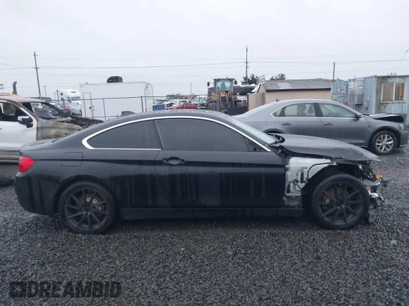 2015 BMW 4 Series 428i xDrive with VIN WBA3N5C56FK197981, listed as a IAAI auction lot 41145927 with 101,944 mi miles and . Bid and sale history available at DreamBid. Image 14.