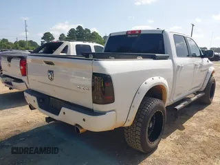 2012 Ram 1500 Sport with VIN 1C6RD7MT0CS190018, listed as a IAAI auction lot 42631890 with 112,071 mi miles and . Bid and sale history available at DreamBid. Image 4.