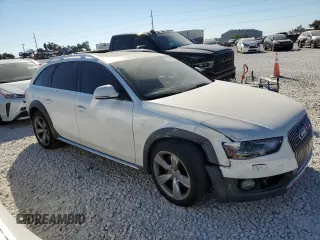 2015 Audi allroad Premium with VIN WA1TFAFL0FA009331, listed as a Copart auction lot 72597954 with 142,507 mi miles and Salvage Title. Bid and sale history available at carsss.com. Image 4.