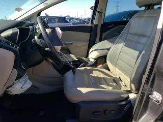 2017 Ford C-Max Energi Titanium with VIN 1FADP5FU9HL102224, listed as a Copart auction lot 59942194 with 105,052 mi miles and Salvage Title. Bid and sale history available at carsss.com. Image 7.