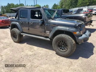 2020 Jeep Wrangler Unlimited Sport Altitude with VIN 1C4HJXDN7LW224107, listed as a Copart auction lot 61435715 with 38,151 mi miles and Salvage title. Bid and sale history available at DreamBid. Image 4.