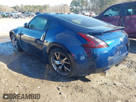 2014 Nissan 370Z Nismo with VIN JN1AZ4EH9EM635608, listed as a IAAI auction lot 41333034 with 45,354 mi miles and . Bid and sale history available at DreamBid. Image 3.