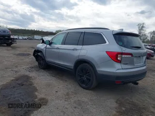 2021 Honda Pilot Special Edition with VIN 5FNYF6H20MB061334, listed as a IAAI auction lot 42123022 with 92,183 mi miles and . Bid and sale history available at DreamBid. Image 3.