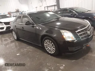 2011 Cadillac CTS with VIN 1G6DC5EY9B0149467, listed as a IAAI auction lot 41614961 with 131,427 mi miles and . Bid and sale history available at DreamBid. Image 1.