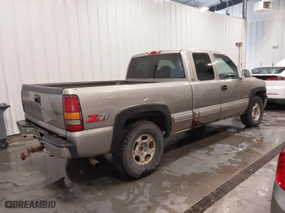 1999 Chevrolet Silverado 1500 LT with VIN 2GCEK19T8X1163660, listed as a IAAI auction lot 41758994 with 227,494 mi miles. Bid and sale history available at carsss.com. Image 4.