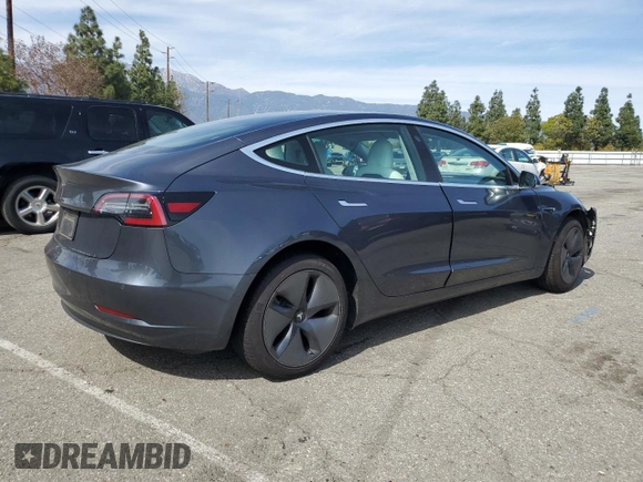2019 Tesla Model 3 Mid Range with VIN 5YJ3E1EA0KF445185, listed as a Copart auction lot 48630675 with 76,351 mi miles and Salvage Title. Bid and sale history available at carsss.com. Image 3.