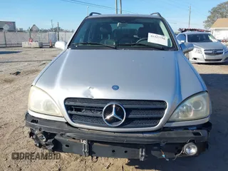 2003 Mercedes-Benz M-Class 3.2L with VIN 4JGAB54E03A383496, listed as a IAAI auction lot 41327756 with 162,973 mi miles. Bid and sale history available at carsss.com. Image 12.