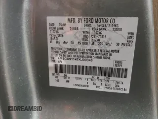 2007 Mercury Mariner Luxury z VIN 4M2CU91147KJ00348, wystawiony jako Copart lot #89218185 z przebiegiem 184 182 mil mil oraz Szkoda całkowita • Salvage title. Historia ofert i sprzedaży dostępna na DreamBid. Obrazek 13.