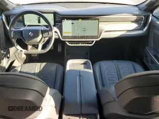 2022 Rivian R1T Launch Edition z VIN 7FCTGAAL6NN002704, wystawiony jako Copart lot #77913144 z przebiegiem 40 665 mil mil oraz Szkody całkowita. Historia ofert i sprzedaży dostępna na DreamBid. Obrazek 8.