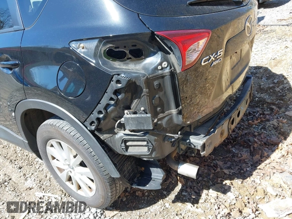 2014 Mazda CX-5 Touring with VIN JM3KE4CY8E0333029, listed as a IAAI auction lot 41857199 with 218,887 mi miles. Bid and sale history available at carsss.com. Image 6.