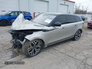2019 Land Rover Range Rover Velar R-Dynamic SE with VIN SALYL2EV7KA795130, listed as a IAAI auction lot 40948729 with 66,353 mi miles and . Bid and sale history available at DreamBid. Image 2.