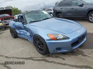 2003 Honda S2000 z VIN JHMAP11423T006018, wystawiony jako IAAI lot #42057260 z przebiegiem 117 340 mil mil oraz . Historia ofert i sprzedaży dostępna na DreamBid. Obrazek 1.