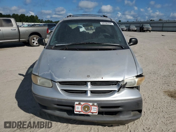 2000 Dodge Caravan SE with VIN 2B4GP45G0YR525310, listed as a Copart auction lot 69596394 with 299,957 mi miles and Salvage Title. Bid and sale history available at carsss.com. Image 5.