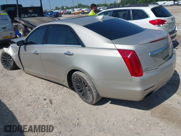 2015 Cadillac CTS Luxury AWD with VIN 1G6AX5SX7F0133440, listed as a IAAI auction lot 42560857 with 82,910 mi miles and . Bid and sale history available at DreamBid. Image 3.
