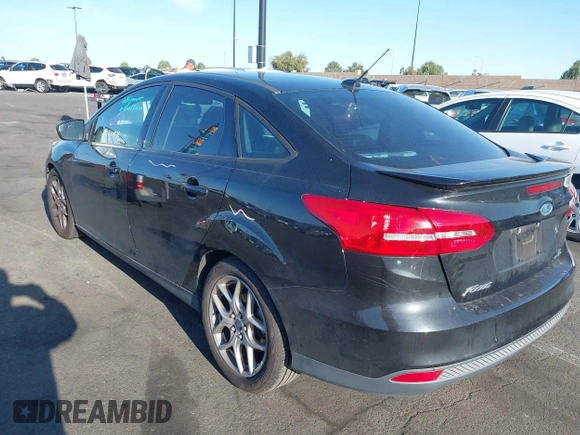 2015 Ford Focus SE with VIN 1FADP3F22FL306055, listed as a IAAI auction lot 41966475 with 139,228 mi miles. Bid and sale history available at carsss.com. Image 3.