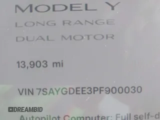 2023 Tesla Model Y Long Range with VIN 7SAYGDEE3PF900030, listed as a IAAI auction lot 41147192 with 13,903 mi miles and . Bid and sale history available at DreamBid. Image 14.
