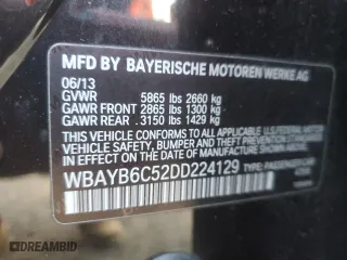 2013 BMW 7 Series 750i xDrive with VIN WBAYB6C52DD224129, listed as a Copart auction lot 52752605 with 122,275 mi miles and Clean Title. Bid and sale history available at carsss.com. Image 12.