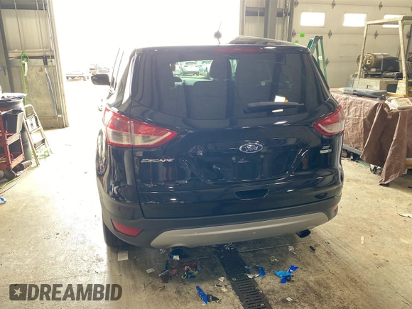 2016 Ford Escape SE z VIN 1FMCU9GX9GUC01824, wystawiony jako IAAI lot #42396853 z przebiegiem 57 608 mil mil oraz . Historia ofert i sprzedaży dostępna na DreamBid. Obrazek 4.