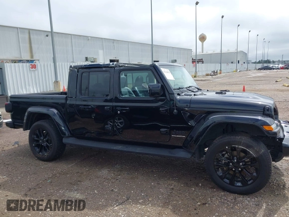 2023 Jeep Gladiator Overland with VIN 1C6HJTFG6PL555153, listed as a IAAI auction lot 42210878 with 40,576 mi miles and . Bid and sale history available at DreamBid. Image 14.
