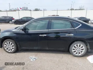 2015 Nissan Sentra SR with VIN 3N1AB7AP8FY308182, listed as a IAAI auction lot 41783618 with 120,947 mi miles and . Bid and sale history available at DreamBid. Image 14.