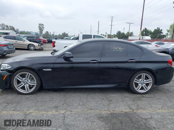 2015 BMW 5 Series 535i with VIN WBA5B1C55FG128387, listed as a IAAI auction lot 41885806 with 94,734 mi miles and . Bid and sale history available at carsss.com. Image 19.