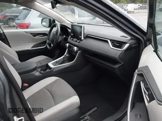 2021 Toyota RAV4 Hybrid XSE with VIN 2T3E6RFV4MW004081, listed as a IAAI auction lot 42300195 with 63,238 mi miles and . Bid and sale history available at DreamBid. Image 5.