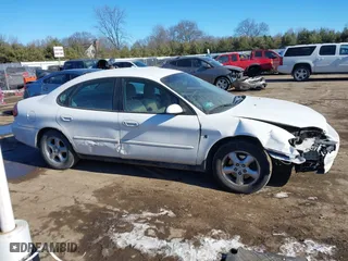 2001 Ford Taurus SES with VIN 1FAFP55231A243171, listed as a IAAI auction lot 41429890 with 131,537 mi miles. Bid and sale history available at carsss.com. Image 13.
