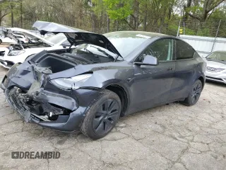 2024 Tesla Model Y Long Range z VIN 7SAYGDEE9RA293776, wystawiony jako Copart lot #51289225 z przebiegiem 12 990 mil mil oraz Szkoda całkowita • Salvage title. Historia ofert i sprzedaży dostępna na DreamBid. Obrazek 1.