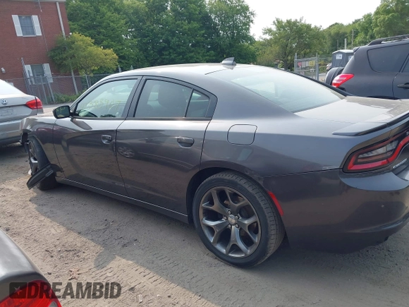 2015 Dodge Charger SXT with VIN 2C3CDXHGXFH897395, listed as a IAAI auction lot 42383907 with 145,334 mi miles and . Bid and sale history available at DreamBid. Image 14.