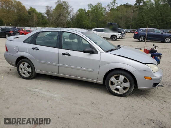 2006 Ford Focus S with VIN 1FAHP34N56W109006, listed as a Copart auction lot 53987745 with 111,677 mi miles and Salvage Title. Bid and sale history available at carsss.com. Image 4.