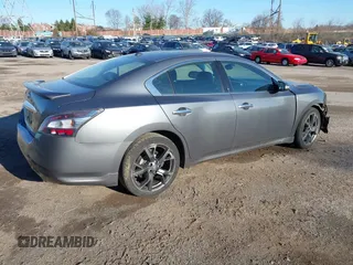 2014 Nissan Maxima S with VIN 1N4AA5APXEC470347, listed as a IAAI auction lot 41897154 with 101,459 mi miles and . Bid and sale history available at DreamBid. Image 4.