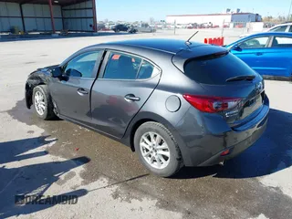 2016 Mazda 3 i Touring with VIN 3MZBM1L74GM299119, listed as a IAAI auction lot 40717069 with 63,083 mi miles and . Bid and sale history available at DreamBid. Image 3.