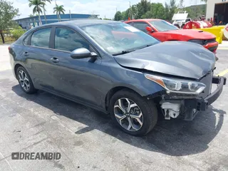 2021 Kia Forte LXS with VIN 3KPF24AD1ME353955, listed as a IAAI auction lot 42160127 with 61,719 mi miles. Bid and sale history available at carsss.com. Image 1.
