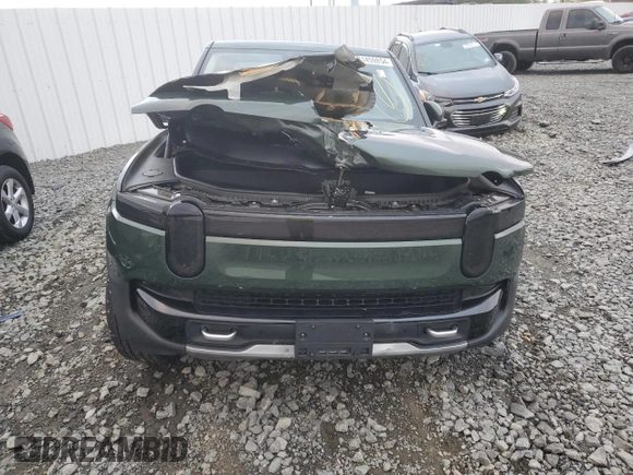 2024 Rivian R1T Adventure z VIN 7FCTGCAA1RN030829, wystawiony jako Copart lot #81459854 z przebiegiem Nie podano mil oraz Szkody całkowita. Historia ofert i sprzedaży dostępna na DreamBid. Obrazek 5.