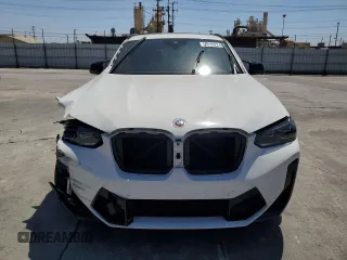 2022 BMW X4 M z VIN 5YM23EC03N9M58487, wystawiony jako Copart lot #68849224 z przebiegiem 22 827 mil mil oraz Szkoda całkowita • Salvage title. Historia ofert i sprzedaży dostępna na DreamBid. Obrazek 5.