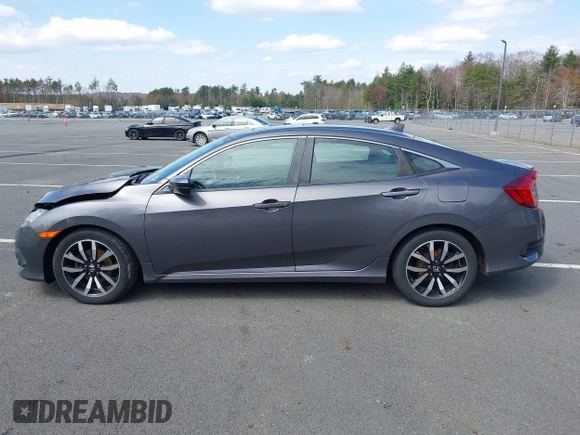 2016 Honda Civic Sedan EX-L with VIN 19XFC1F73GE201419, listed as a IAAI auction lot 42027720 with 168,134 mi miles. Bid and sale history available at carsss.com. Image 14.