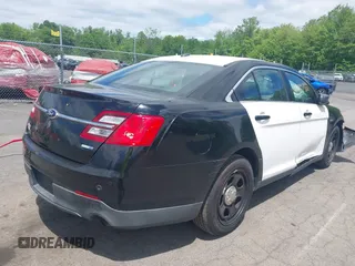 2014 Ford Police Interceptor with VIN 1FAHP2MKXEG185863, listed as a IAAI auction lot 42297860 with 115,188 mi miles and . Bid and sale history available at DreamBid. Image 4.