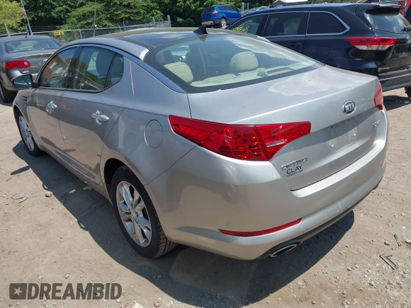 2013 Kia Optima EX with VIN 5XXGN4A79DG133492, listed as a IAAI auction lot 42742932 with 85,179 mi miles and . Bid and sale history available at DreamBid. Image 3.