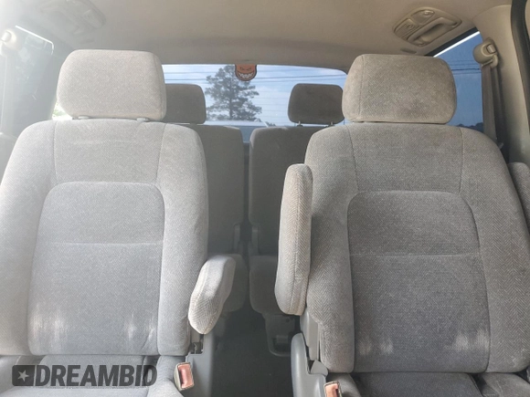 2003 Kia Sedona LX with VIN KNDUP131236411909, listed as a Copart auction lot 73715384 with 179,642 mi miles and Salvage Title. Bid and sale history available at carsss.com. Image 10.