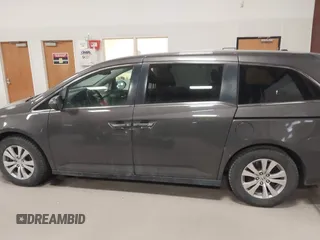 2015 Honda Odyssey EX-L with VIN 5FNRL5H64FB055890, listed as a IAAI auction lot 41706141 with 155,167 mi miles and . Bid and sale history available at carsss.com. Image 14.