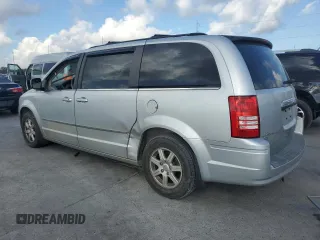 2010 Chrysler Town & Country Touring with VIN 2A4RR5DXXAR137658, listed as a Copart auction lot 72443994 with 101,934 mi miles and Salvage Title. Bid and sale history available at DreamBid. Image 2.