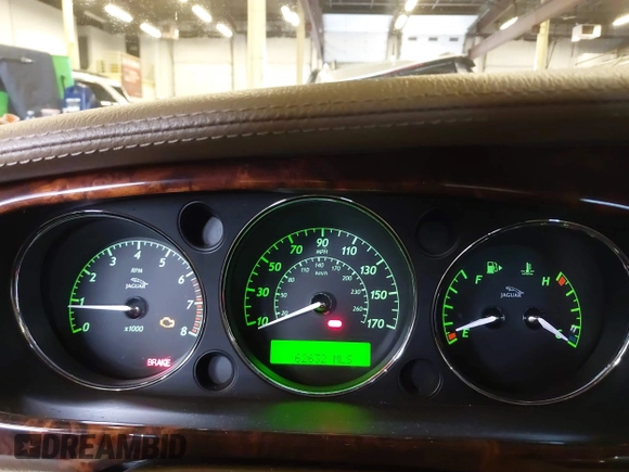 2008 Jaguar XJ Vanden Plas z VIN SAJWA82B28SH29030, wystawiony jako IAAI lot #41231242 z przebiegiem 62 632 mil mil oraz . Historia ofert i sprzedaży dostępna na DreamBid. Obrazek 7.
